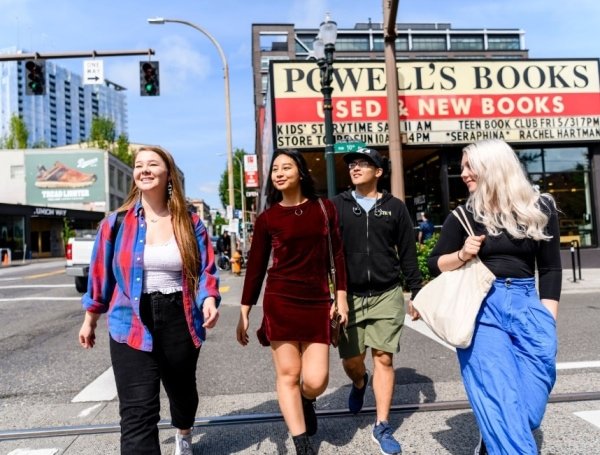 students walking down street